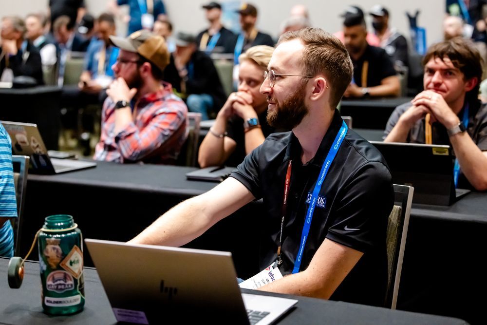 InfoComm attendee listens attentively to the speaker