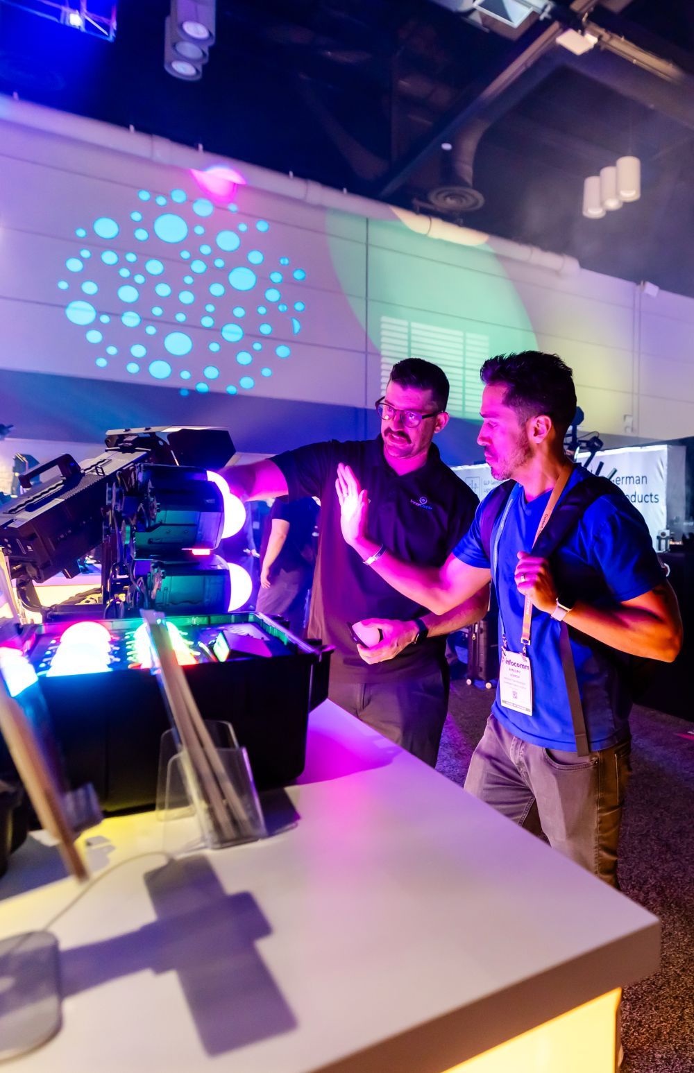 An attendee tests out the latest lighting gear at an exhibitor's booth