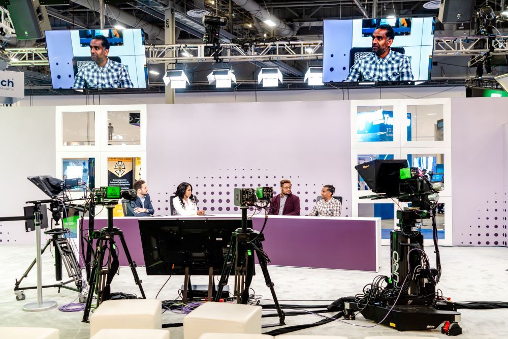 Four AVIXA TV panelists talk on stage
