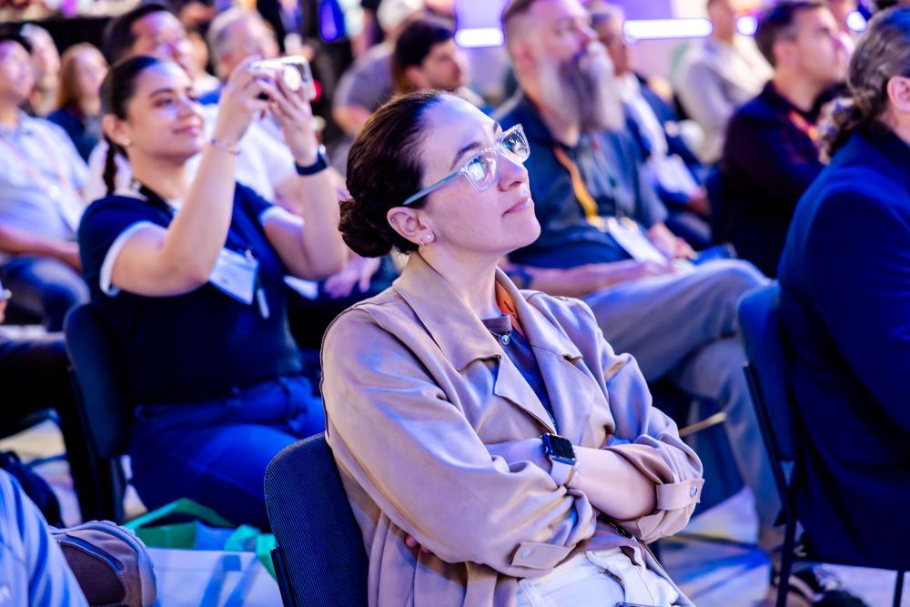An attendee listens to a Technology Innovation Stage session at InfoComm