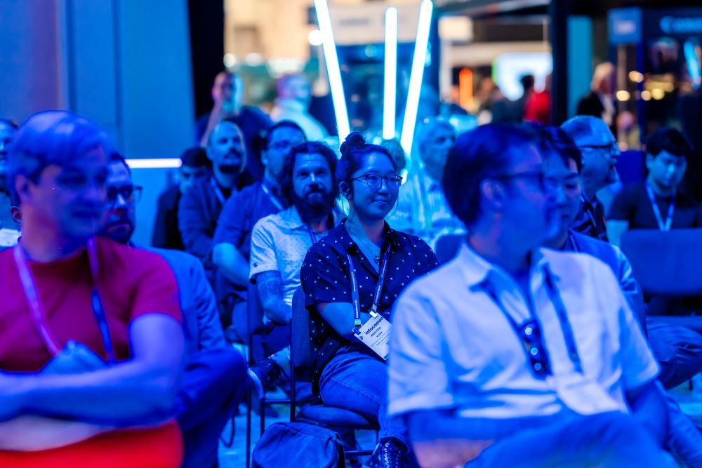 Attendees engaging with show floor education