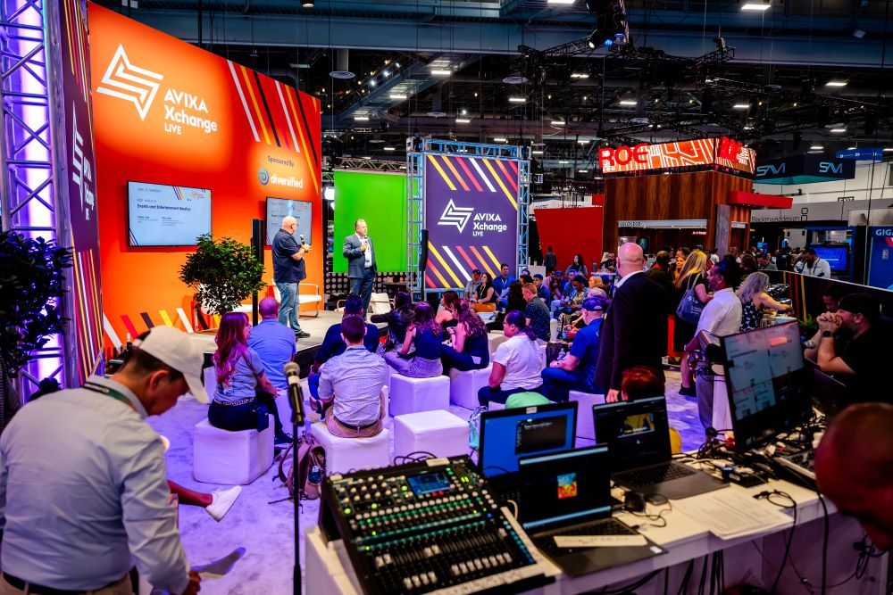 The Xchange Live booth full of InfoComm attendees