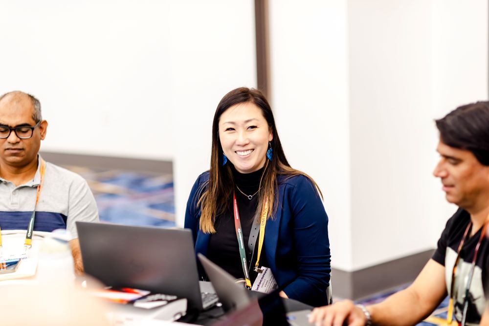 Training course students collaborate at a round table
