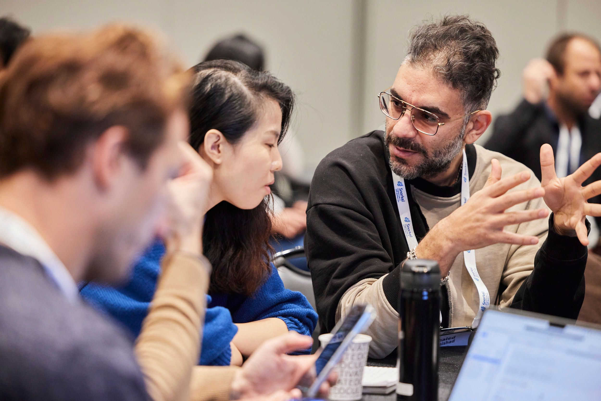 Attendees at The AI Summit New York taking part in the Hackathon