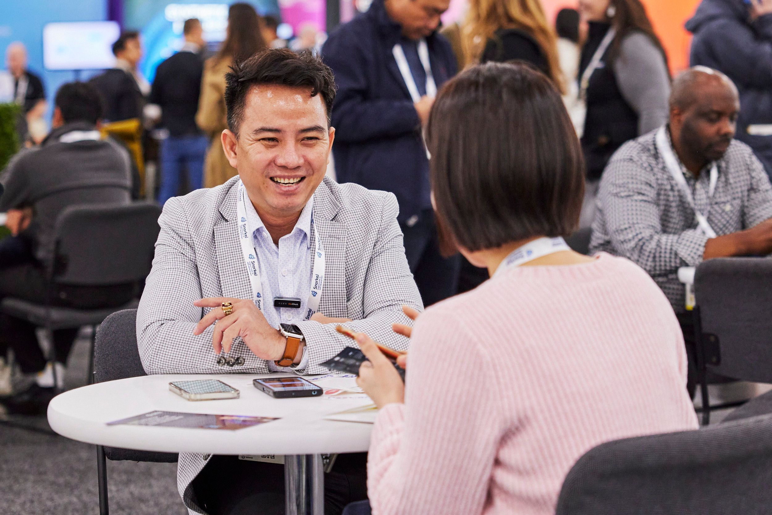 Two attendees at The AI Summit New York networking