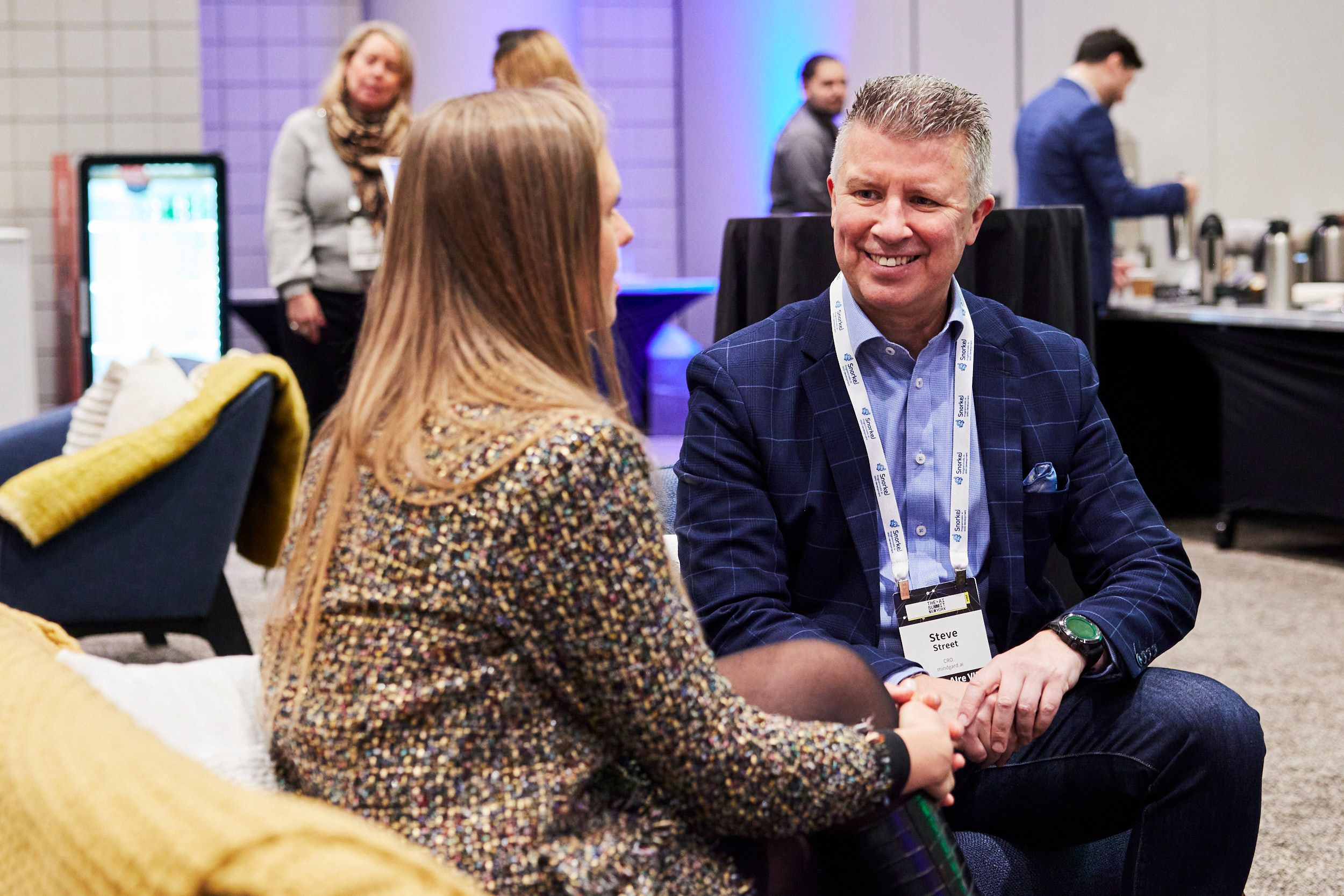 Two attendees at The AI Summit New York networking