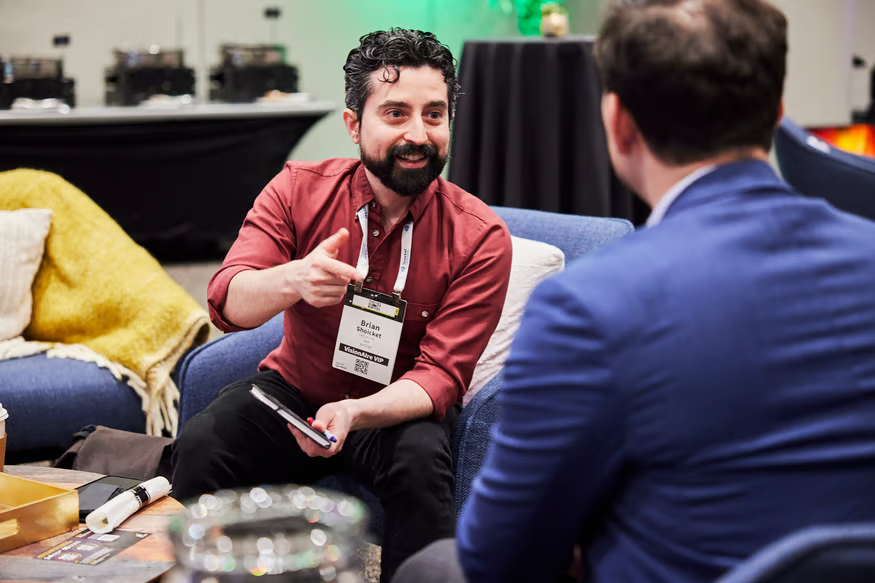 Two attendees at The AI Summit New York networking
