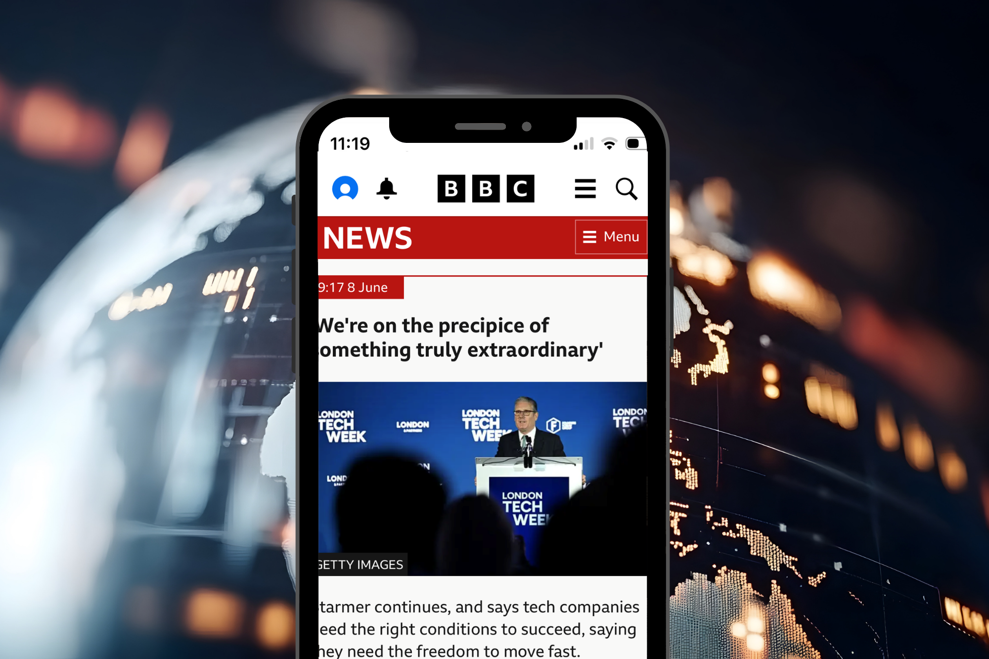 An image of a phone showing a news article on Kier Starmer at London Tech Week 2026