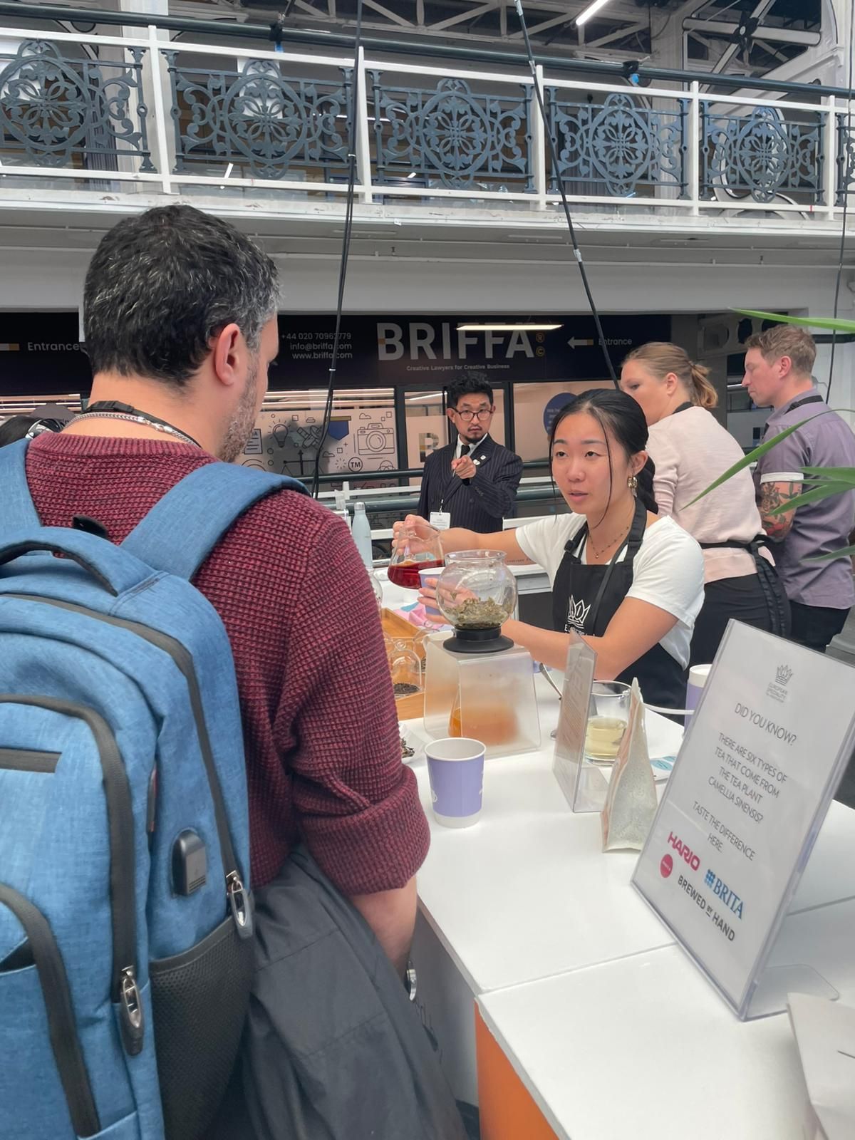 A tea specialist sharing product knowledge