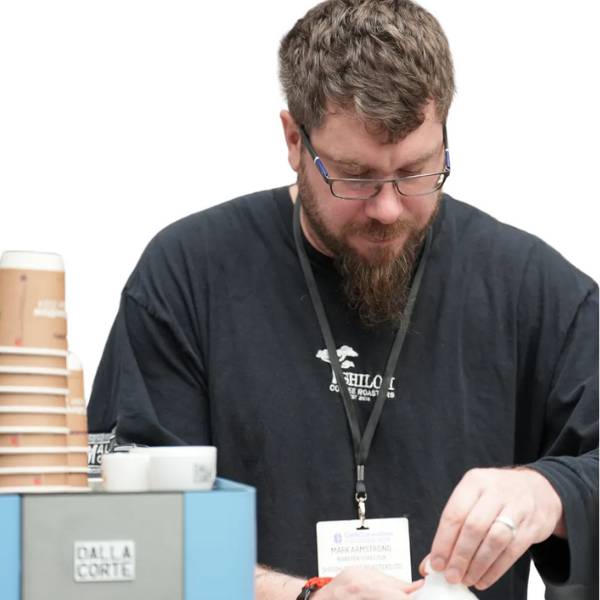 Barista pouring making coffee