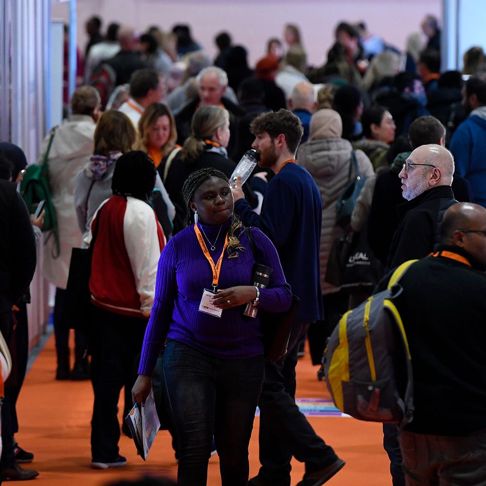 Image of delegates in aisle way