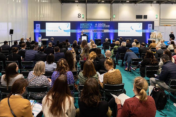 Dental professionals attend keynote lectures on the latest clinical techniques.