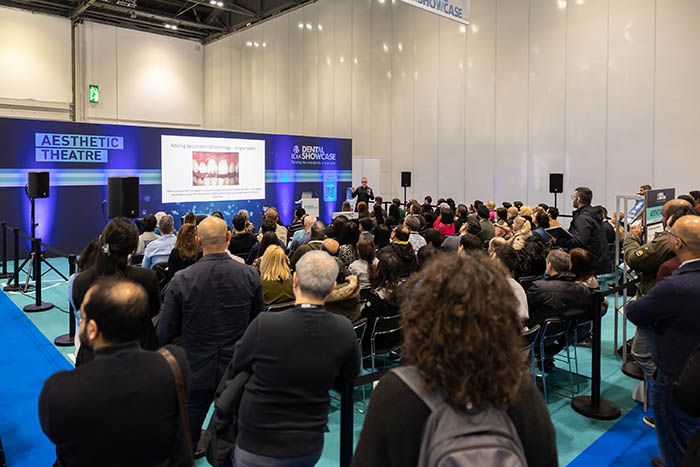 Dental professionals attend dental show on innovations in cosmetic dentistry and facial aesthetics.
