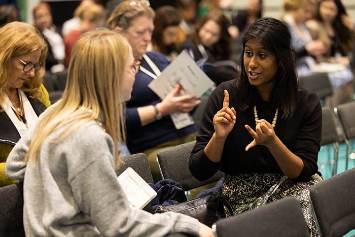  Dental professionals attend lectures on the latest restorative dentistry techniques.
