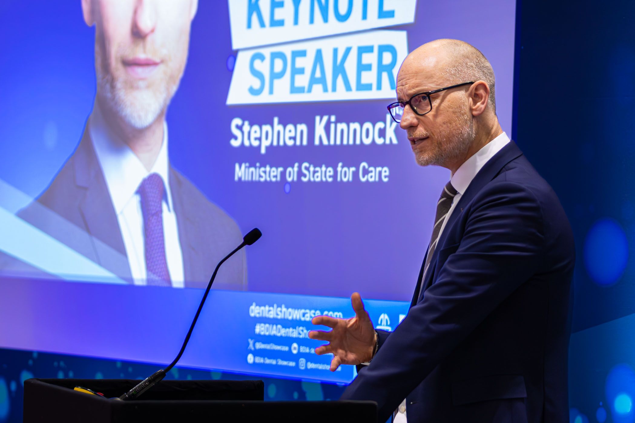 A member of the dental profession addresses an audience of expert dentists and odontologists with a speech about dental compliance at the Dental Update Theatre during the BDIA Dental Showcase conference.