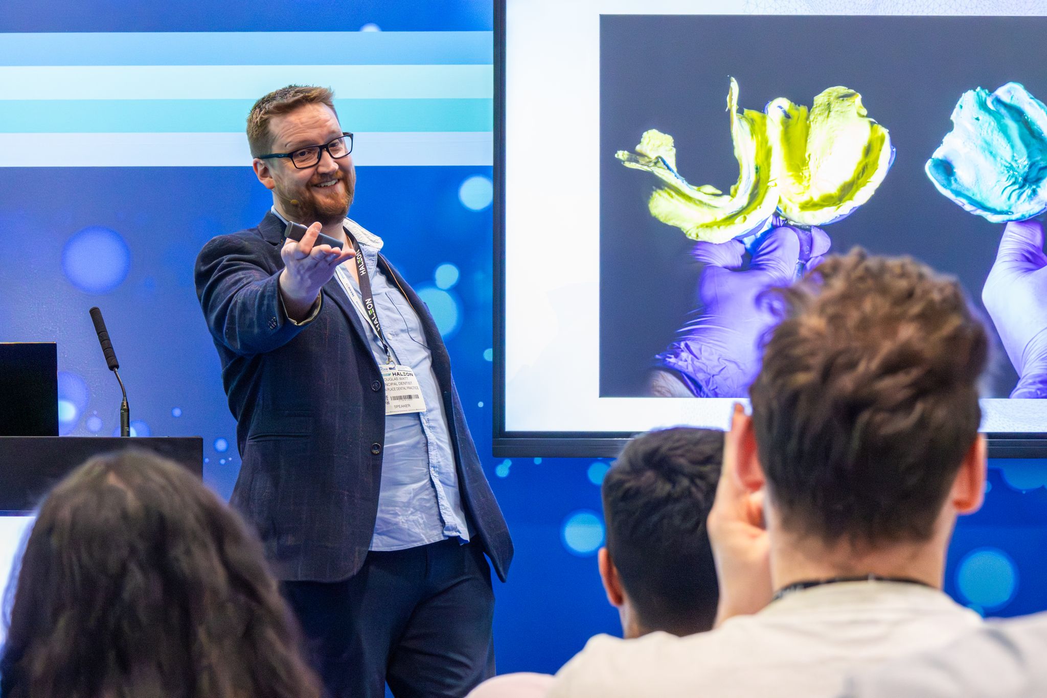 An expert speaker presenting a conference session