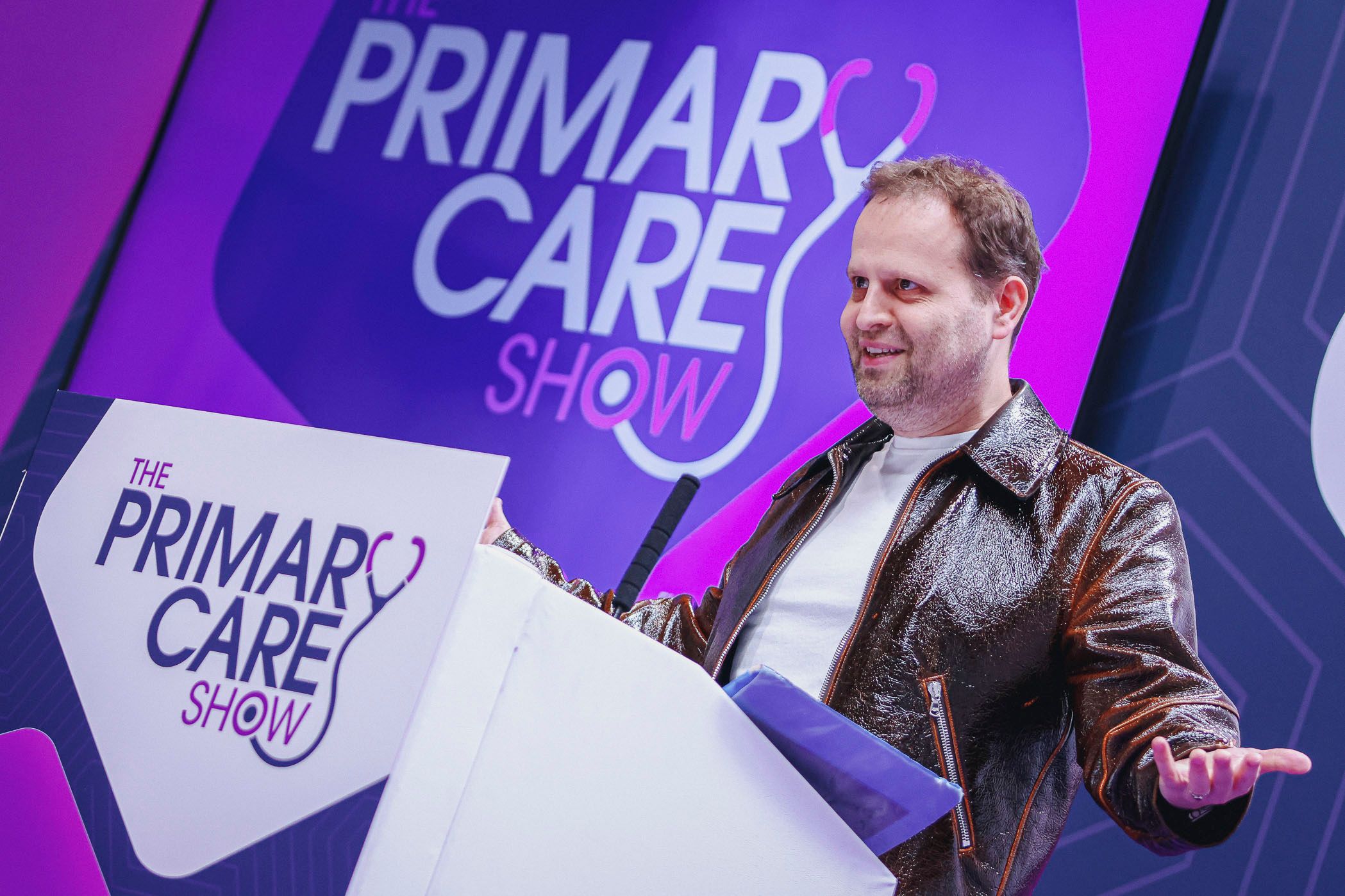 Adam Kay speaking at the primary care show