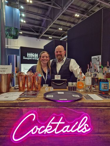 Giles and Jodie Sip 'n' Swig Cocktail Bar at Confex 2023 with The Delegate Wranglers
