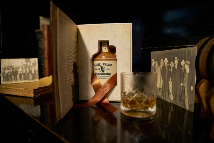Bespoke Moonshine Whiskey presented in branded book style box with hidden compartment
