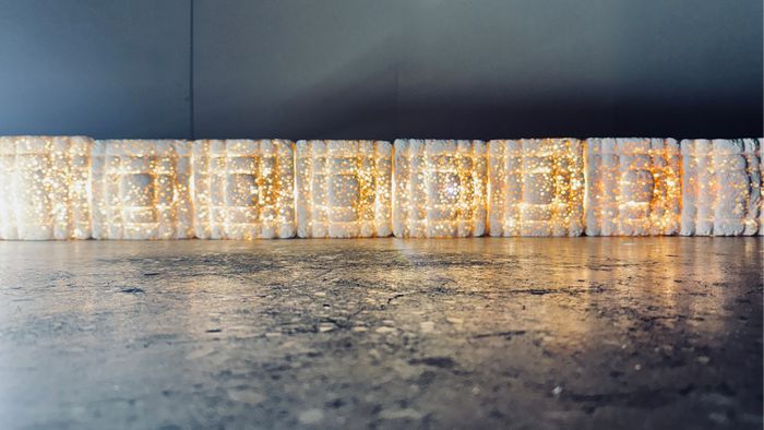 modular light system designed to integrate seamlessly into interiors through tile-like or brick forms
