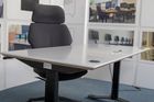 Sit-stand heated desk