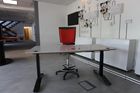 Sit-stand heated desk
