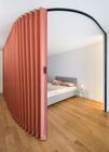 Folding door with curved track