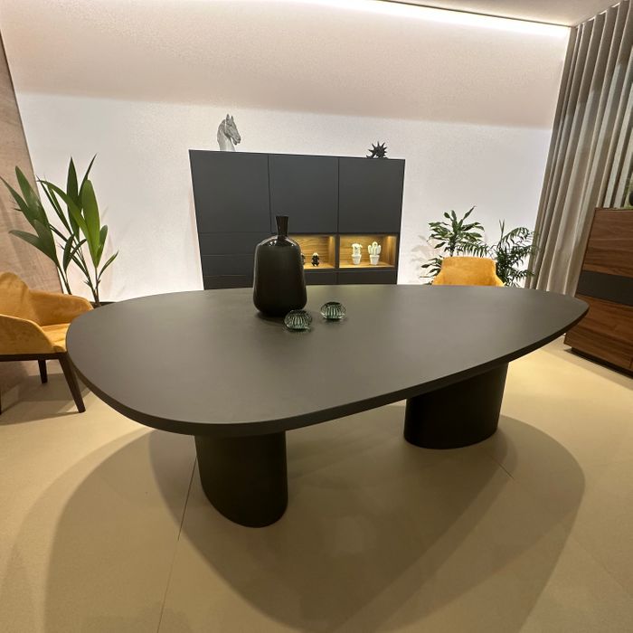 A Graphic Meeting Point: Athena Triangular Oak Table in Textured Cement Finish
