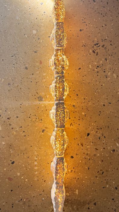 modular light system designed to integrate seamlessly into interiors through tile-like or brick forms