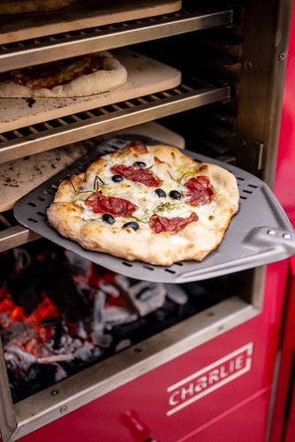 Bake three pizzas at once with Charlie Oven