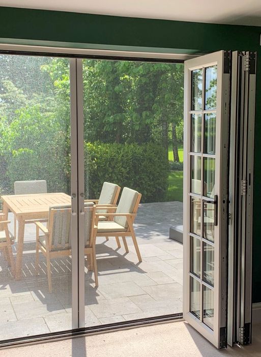 Manual fly screens for doors
