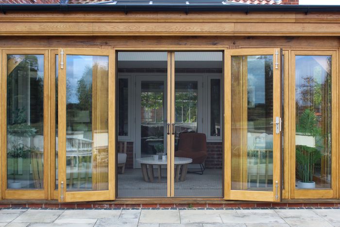 Manual fly screens for doors