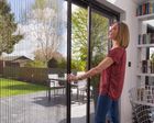 Manual fly screens for doors (pleated)