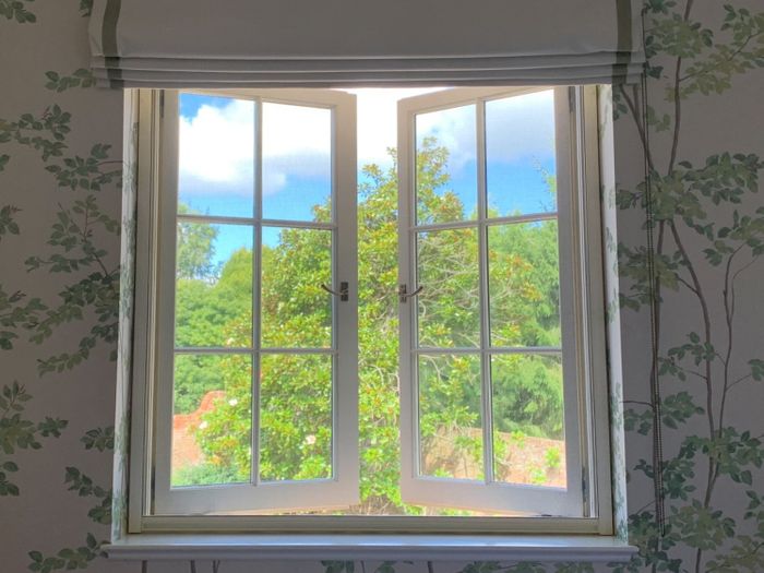 Manual fly screens for windows