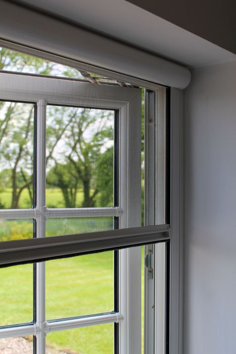 Manual fly screens for windows