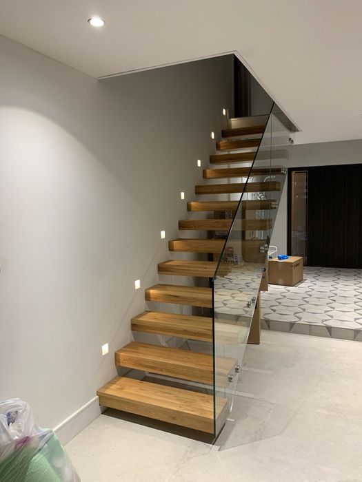 Est 1989 Staircase both floating and central spine