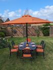 Six seater oval patio set in cast aluminium