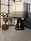Empowerella Turns Ornate Porcelain Whiskey Decanters into Unique Handcrafted Lighting