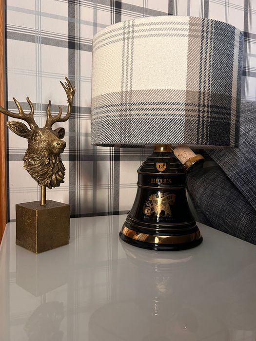 Empowerella Turns Ornate Porcelain Whiskey Decanters into Unique Handcrafted Lighting