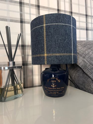 Empowerella Turns Ornate Porcelain Whiskey Decanters into Unique Handcrafted Lighting