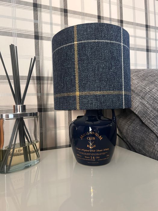 Empowerella Turns Ornate Porcelain Whiskey Decanters into Unique Handcrafted Lighting
