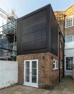 mata architects incorporates dynamic 'black box' extension into victorian house in london | Construction Buzz #210