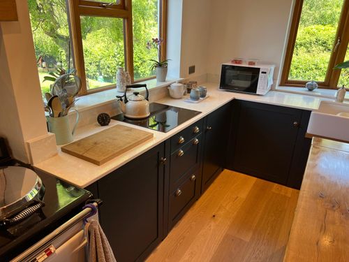 Solid wood kitchens with quartz worktops.