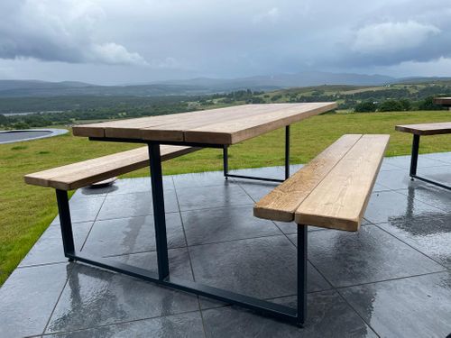 Handmade picnic bench with fixed seating