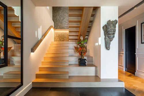 Modern style bespoke staircase of a 3-storey residential house