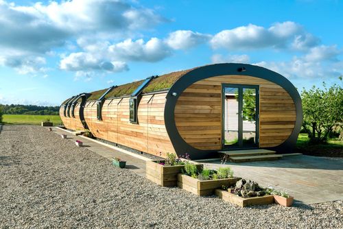 Modular provider exhibits curved green roof on unique eco-building