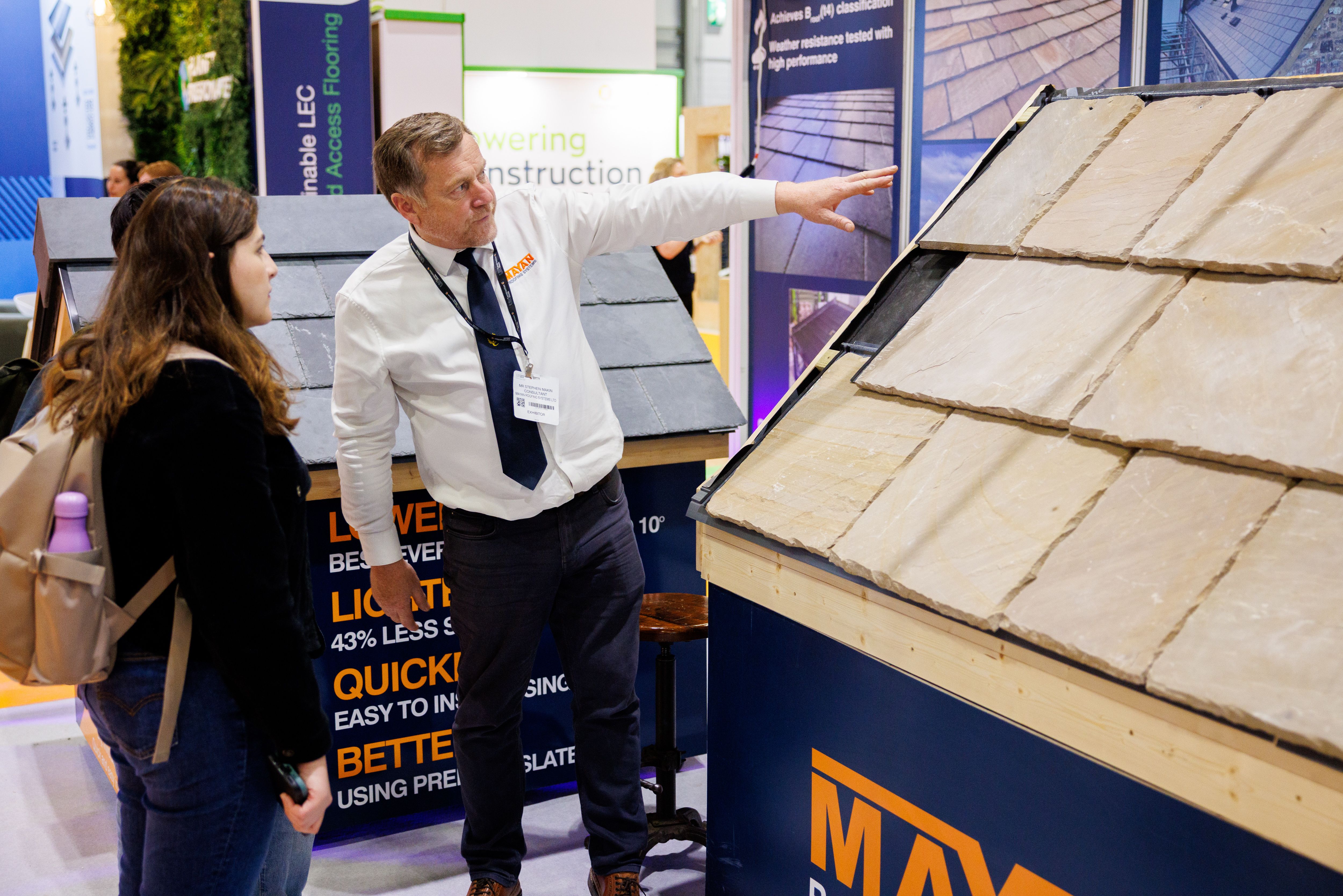 Visitors exploring roofing solutions at UK Construction Week