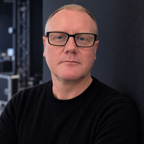 Speaker profile image for Alex Dinnin