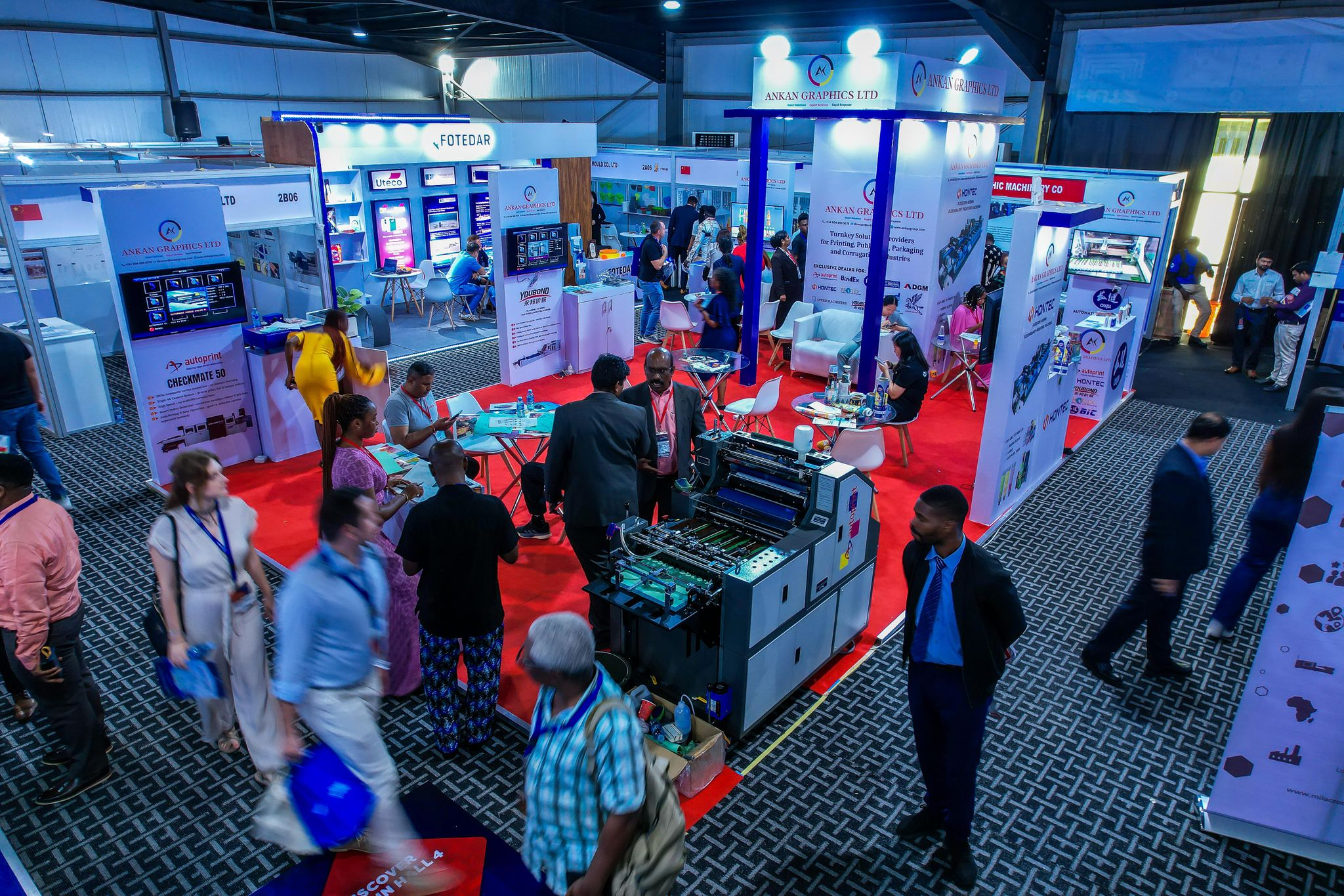Visitors exploring the floor plan