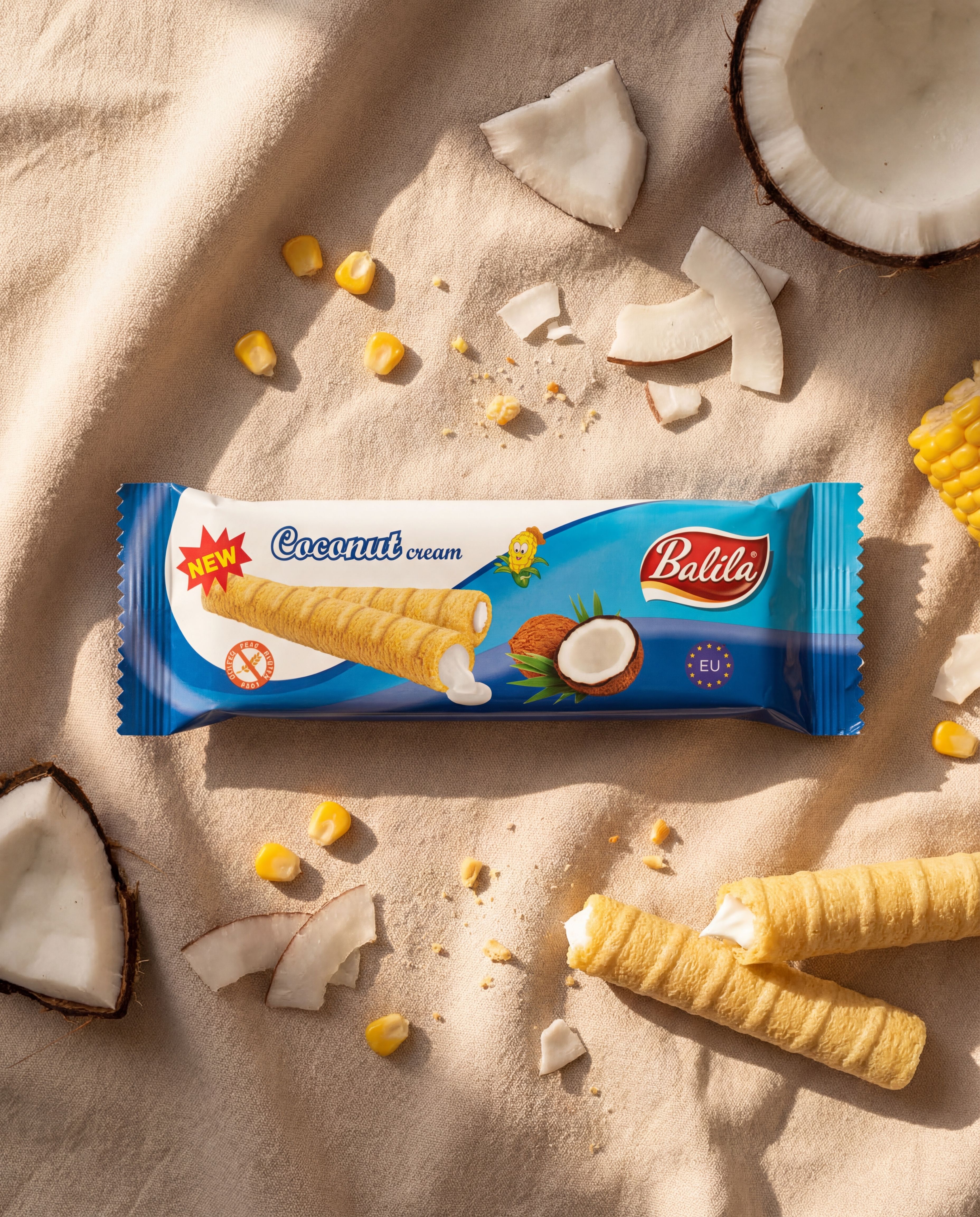 Puffy corn fingers filled with Coconut flavour cream (83%), 18 g